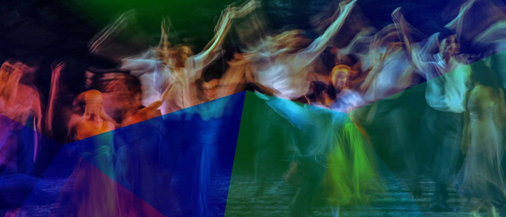 Image of dancers blurred to create abstract effect