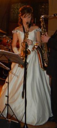 Photo of Jana Anderson playing the saxaphone