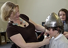 Linda Fabiani meets Hunterian Junior Archaeologist Ethan Gilmour (10) from Lenzie Moss Primary School.