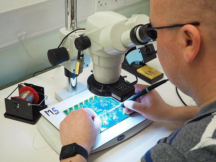 Image of Andrew Phillips at soldering station