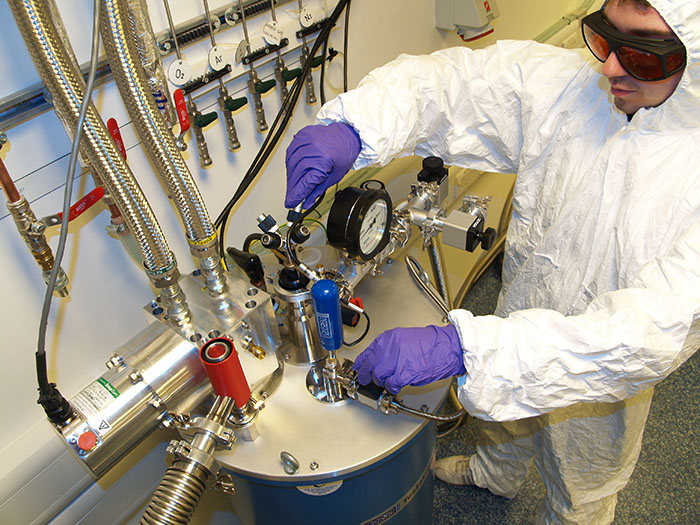 Image of student working on a lab experiment