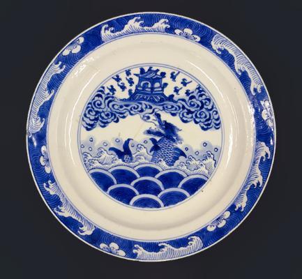This is a Qing dynasty plate from the Kangxi period (1662-1722).