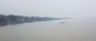 Hazy view of a river bank