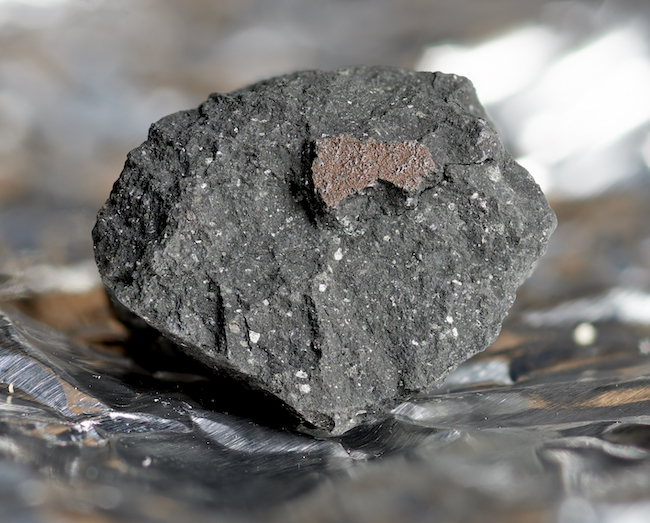 An image of one of the fragments of the Winchcombe meteorite. CREDIT Trustee of the Natural History Museum