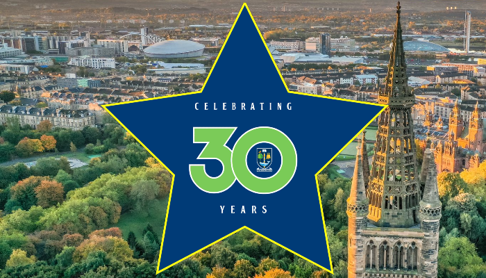 A star graphic with 30 years of service inside and placed over the backdrop of the UofG campus