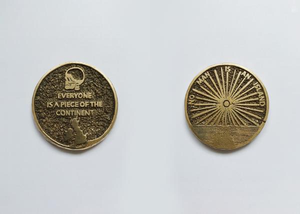 Bronze medal with image of skull