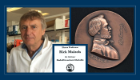 A graphic showing Professor Rick Maizels and the Rudolf Leuckart medal