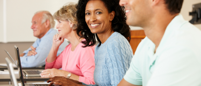 Person at computer smiling