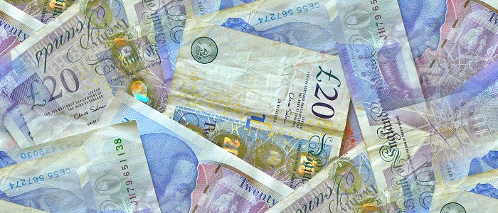 Photo of a pile of £20 and other notes