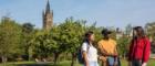 UofG Students standing in front of the UofG Tower