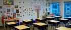 An empty classroom with decorations on the walls 