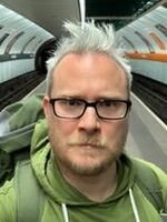 Close-up of man on subway platform