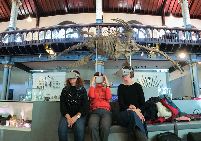 visitors in hunterian museum with VR headsets