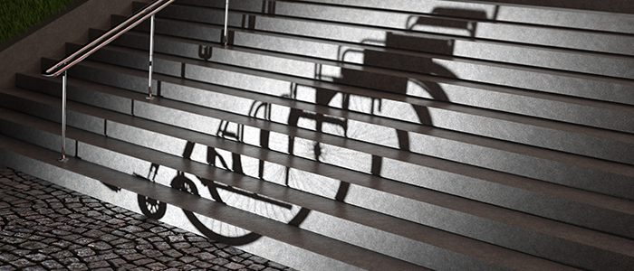 Wheelchair shadow on stairs