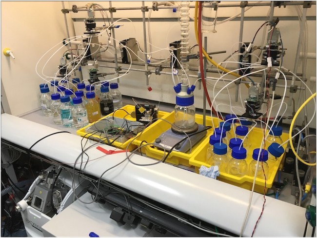 A photograph of the Cronin Group's chemical robot system