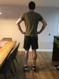 Man standing doing exercise