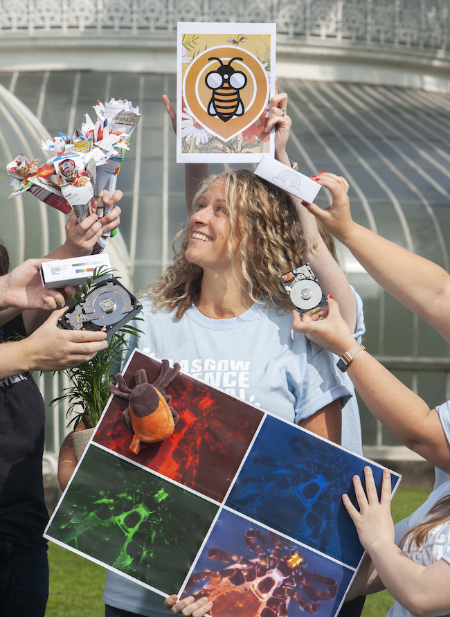 Dr Deborah McNeill, director of the Glasgow Science Festival, is pictured in Glasgow Botanic Gardens surrounded by some of the activities showcased in this year's festival