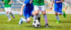 Photo of men playing football