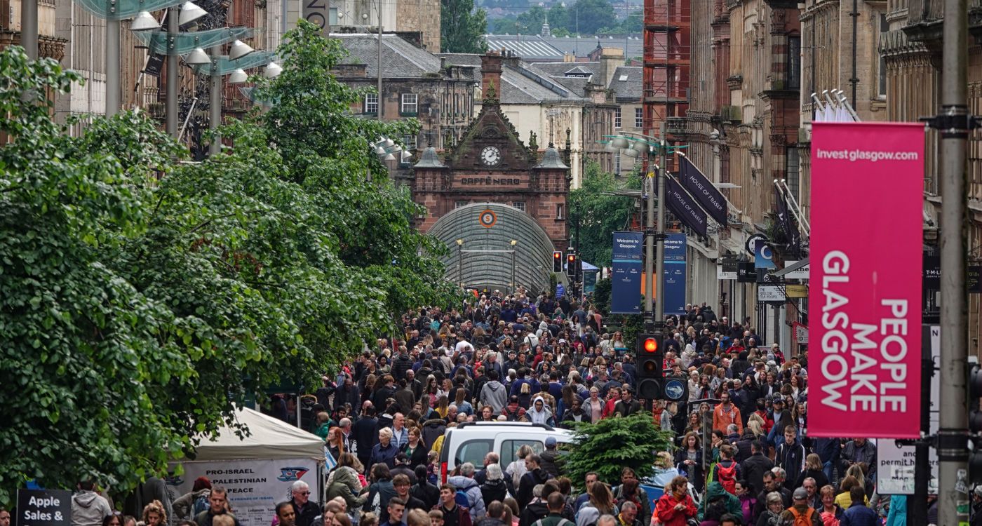 Buchanan Street, looking down towards St Enoch's Station, filled with people during an afternoon day. [Photo: Shutterstock]