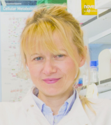 A head and shoulders shot of Dr Mariola Kurowska-Stolarska in the lab