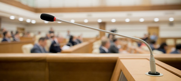 Speaker microphone at a parliamentary-style conference room