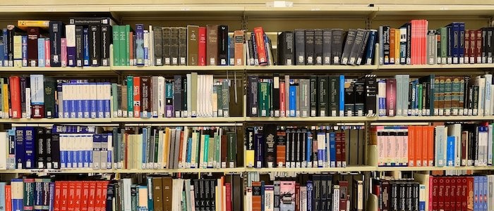 Image of library shelves with old books