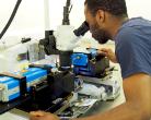 Student using a microscope