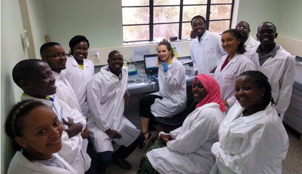 Kirstyn Brunker holding the final sequencing library prepared by participants during the One Health rapid genome sequencing workshop at the University of Nairobi Institute of Tropical & Infectious Diseases, Kenya. 