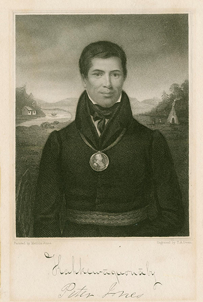 A portrait of a man from waist up wearing a formal high necked jacket and cravat, and a large medallion.
