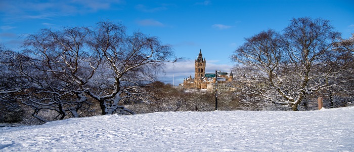 View of the main building and the ground is covered in snow 