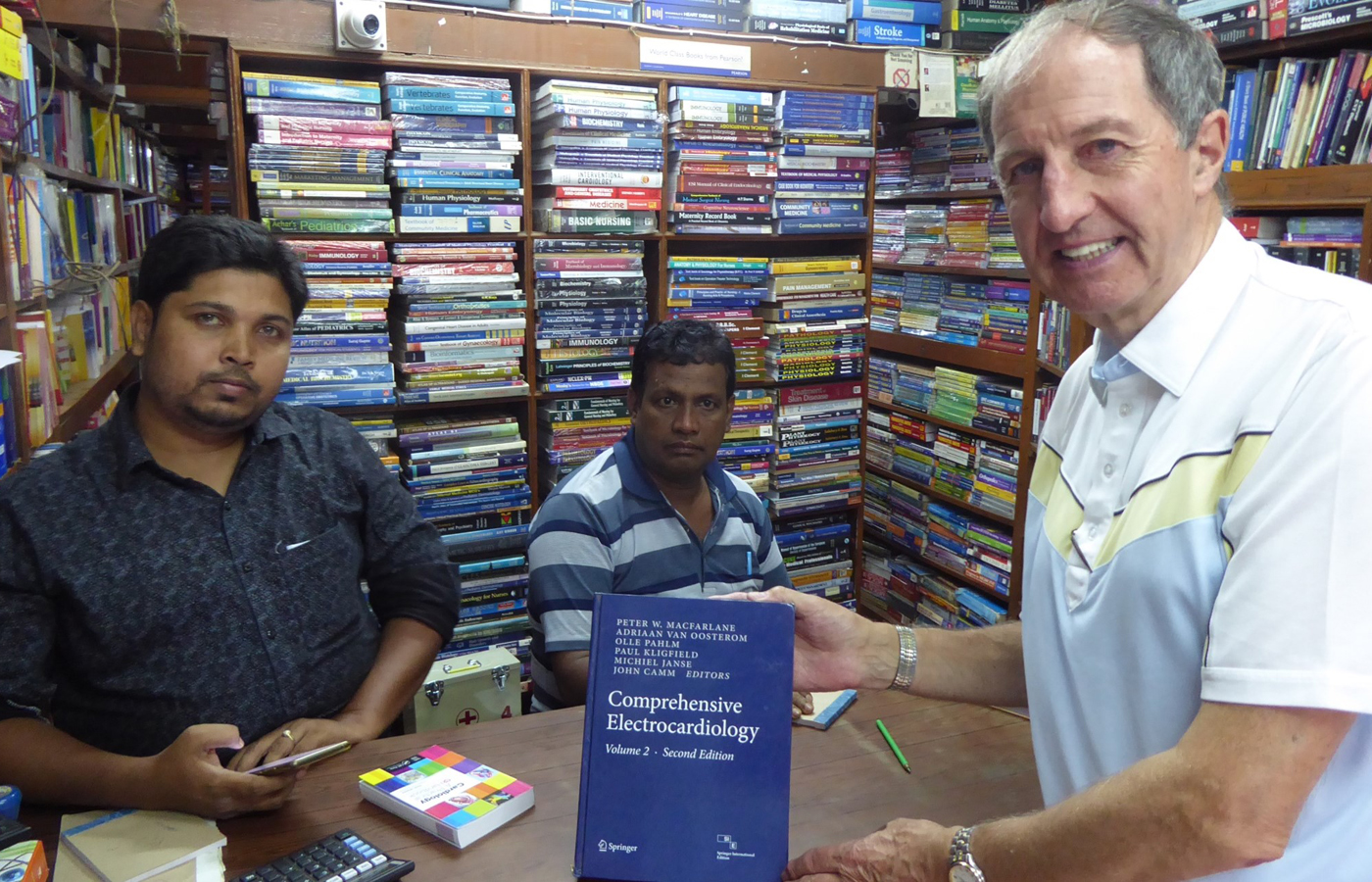 Photo of Peter Macfarlane in a bookshop in Kolkata