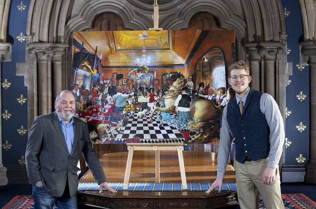 Professor Gerard Carruthers, Co-Director of the Centre for Robert Burns Studies with the Burns Supper inspired artwork The Flying Haggis with Dr Paul Malgrati a Research Assistant on The Burns Supper in History and Today project at the University of Glasgow. Credit Martin Shields