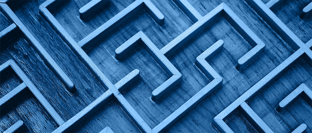 Photograph of a close-up of a wooden maze