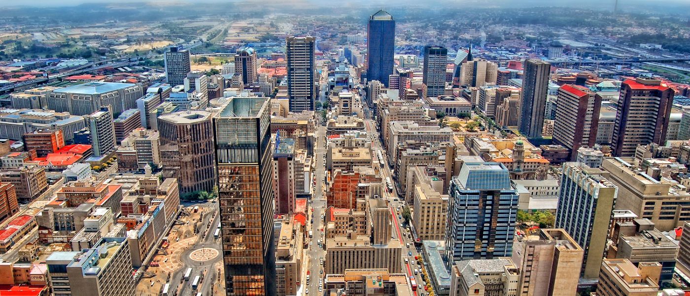 Aerial view of skyscrapers and streets below in Johannesburg's business district