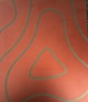 Red tile woith grey squigly lines, outline of Glasgow map