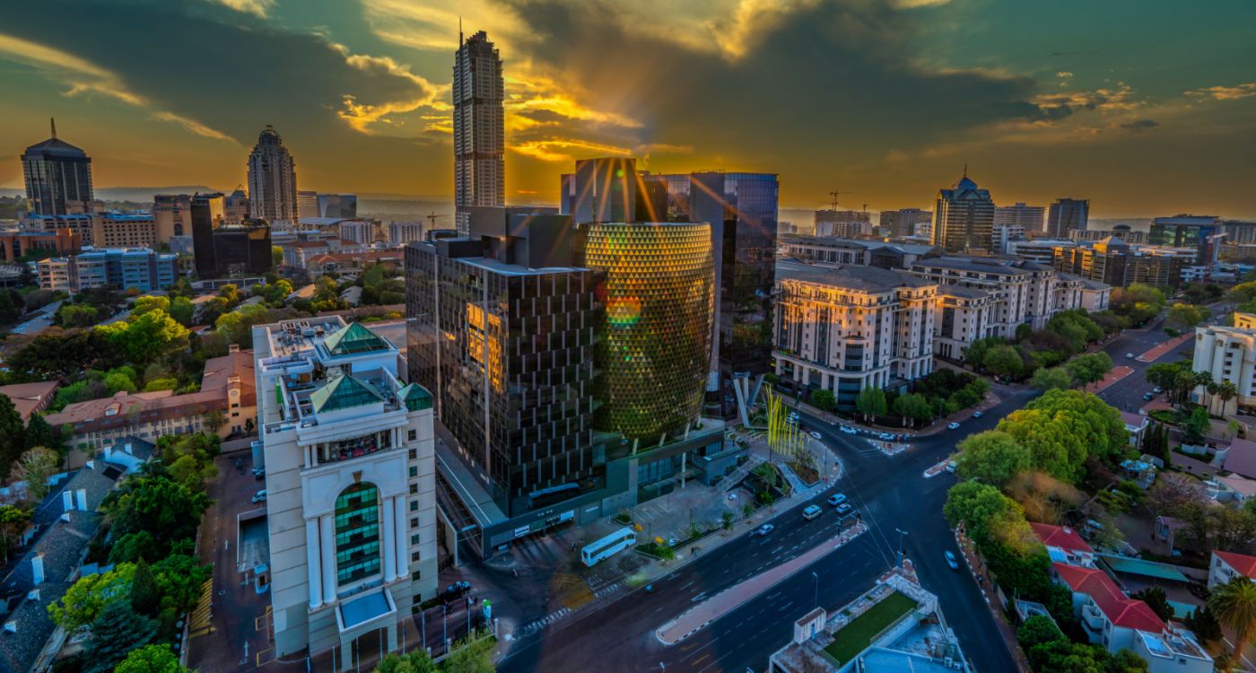 Sunset over Sandton city skylines [Photo: Shutterstock]