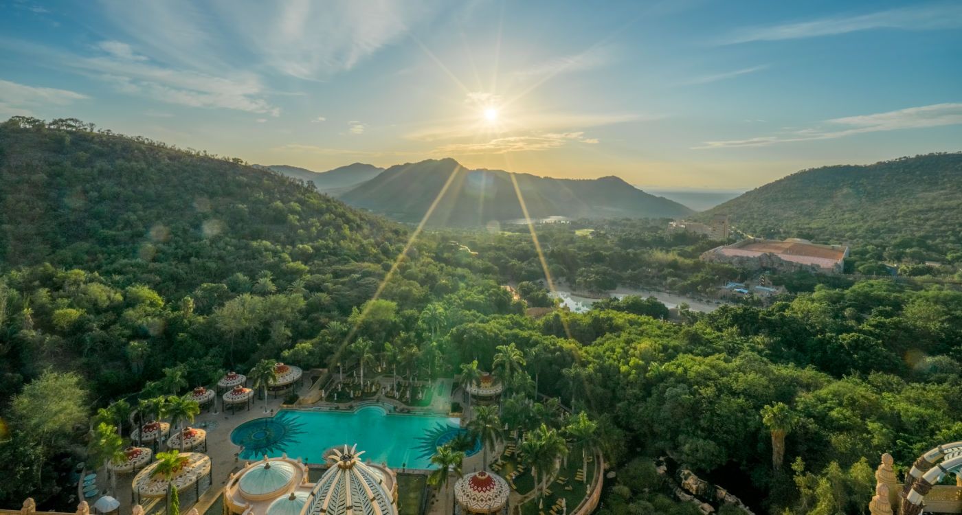 Aerial sunrise scene of Sun City with flare and ray from the sunrise [Photo: Shutterstock]
