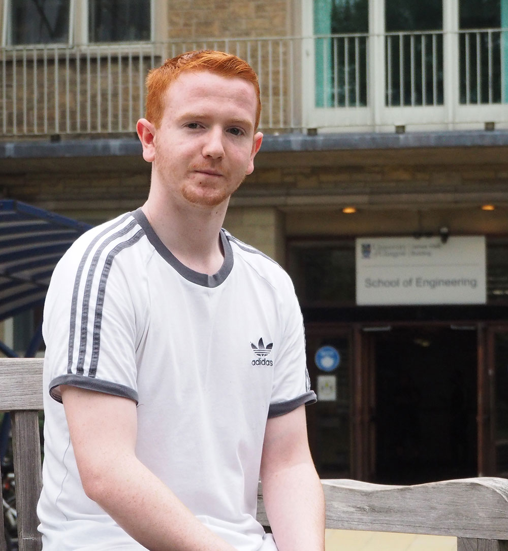 Photo of Thomas McLurg outside the James Watt South building.