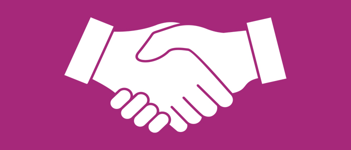 Graphic of shaking hands on a pink background