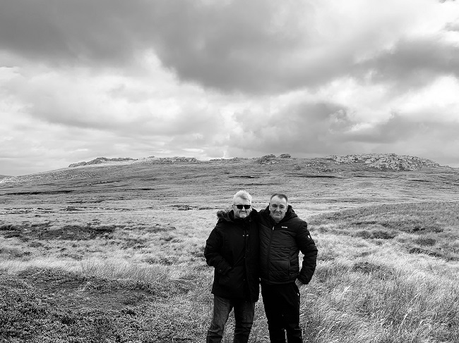 Two Falklands War veterans at Tumbledown on Falkland Islands as part of a project to map the battefields during the 40th anniversary of the start of the conflict