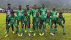 A team photo showing Rumphi United on the pitch wearing their WCIP-sponsored, all-green kits
