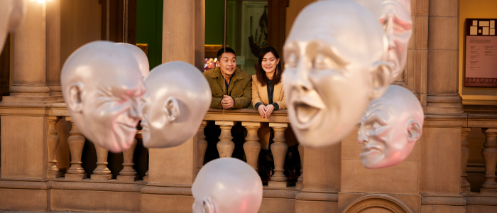 Two students across the balcony at Kelvingrove Museum