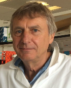A head and shoulders image of Professor Rick Maizels in the lab