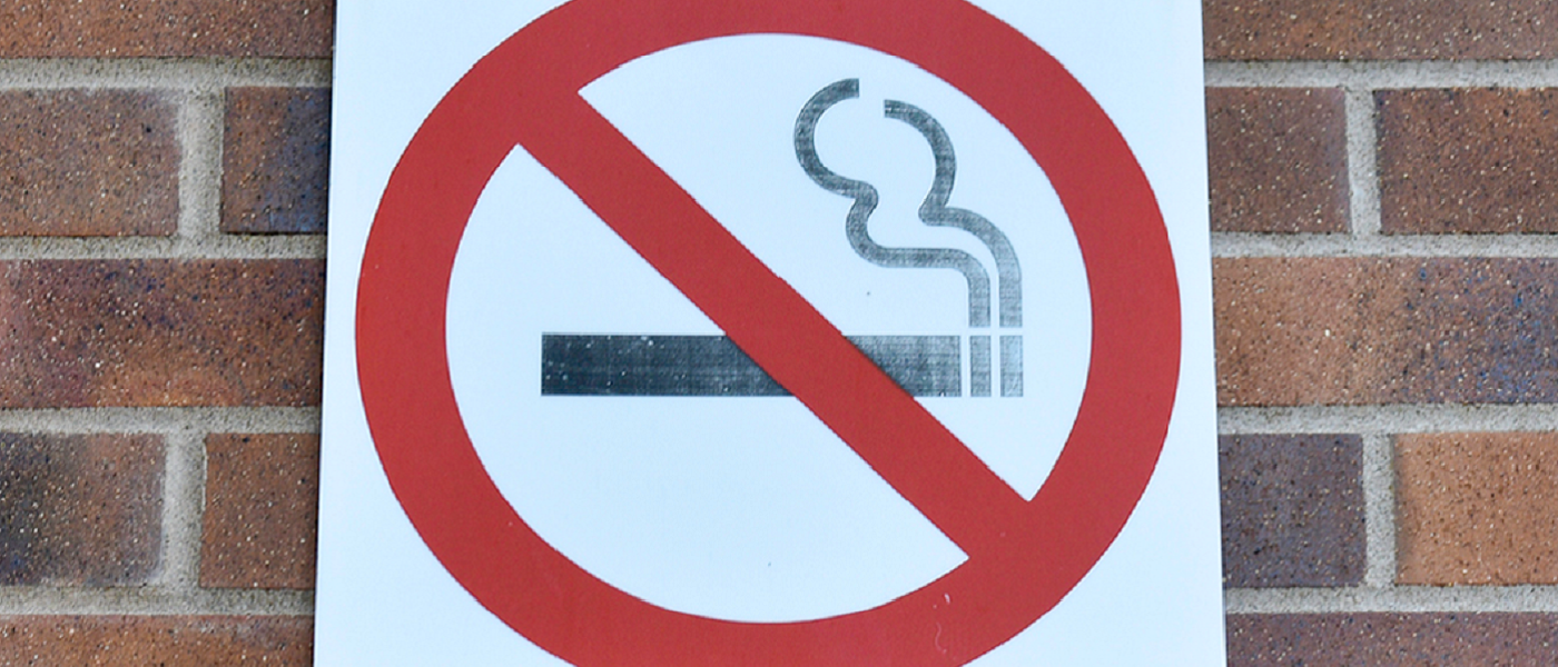Photo of no smoking sign on a wall