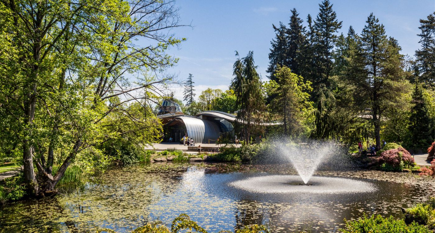 Grounds and lake in VanDusen Botanical Gardens with the visitor centre in the background [Photo: Shutterstock]