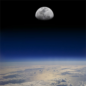 Moon rising over Earth
