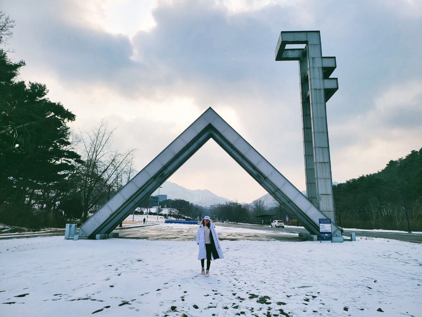 Angela Weihan standing outside Seoul's National University Main Gate
