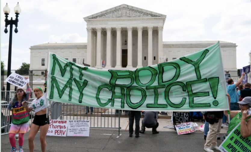 Abortion rights activists gather outside the Supreme Court in Washington, Friday, June 24, 2022.