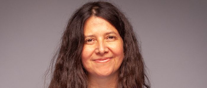 A smiling research fellow