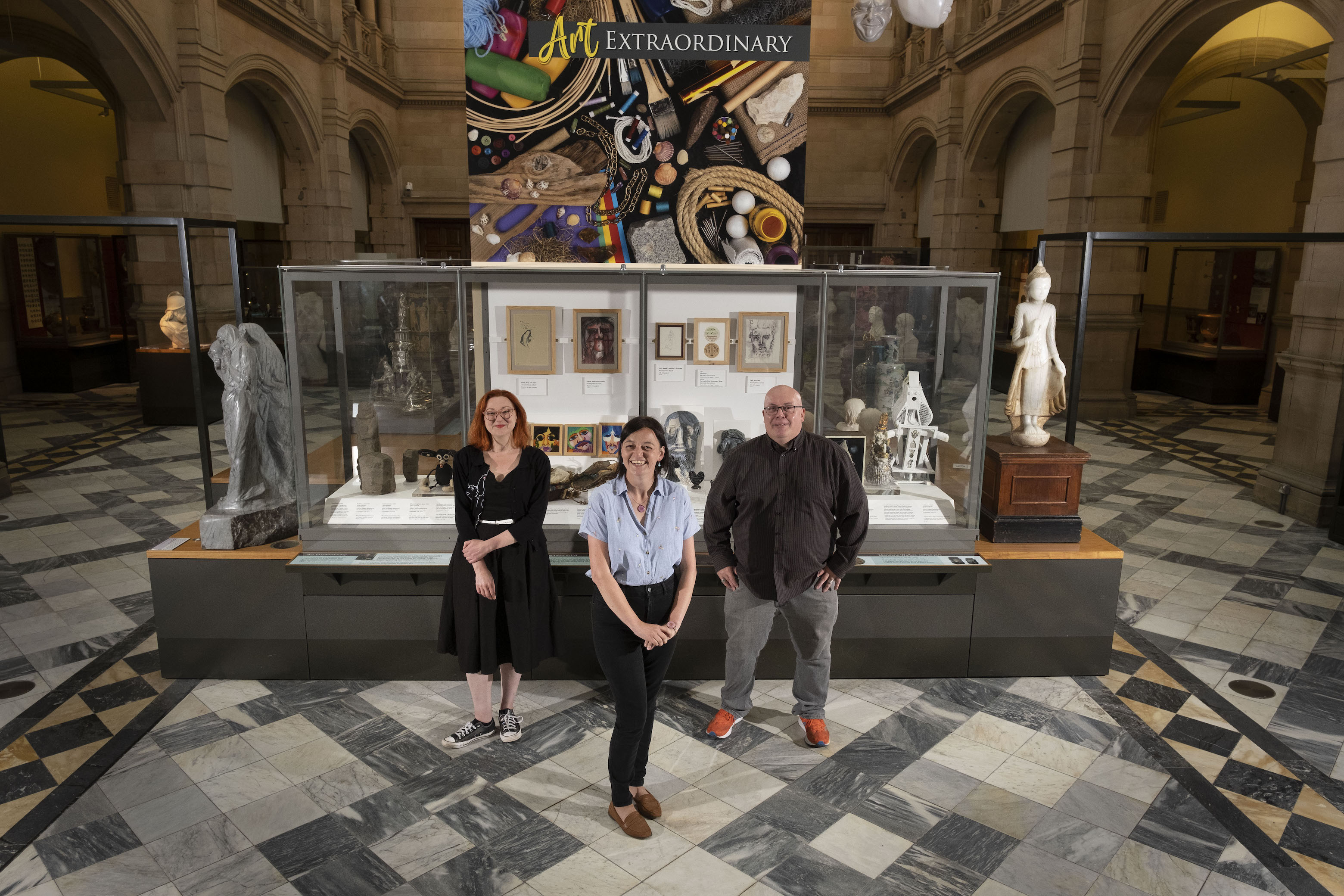 Dr Cheryl McGeachan, Dr Anthony Lewis and Claire Coia at the Art Extraordinary display at Kelvingrove Art Gallery and Museum